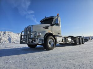 2023 Peterbilt 567 Tri-Drive Grain Truck